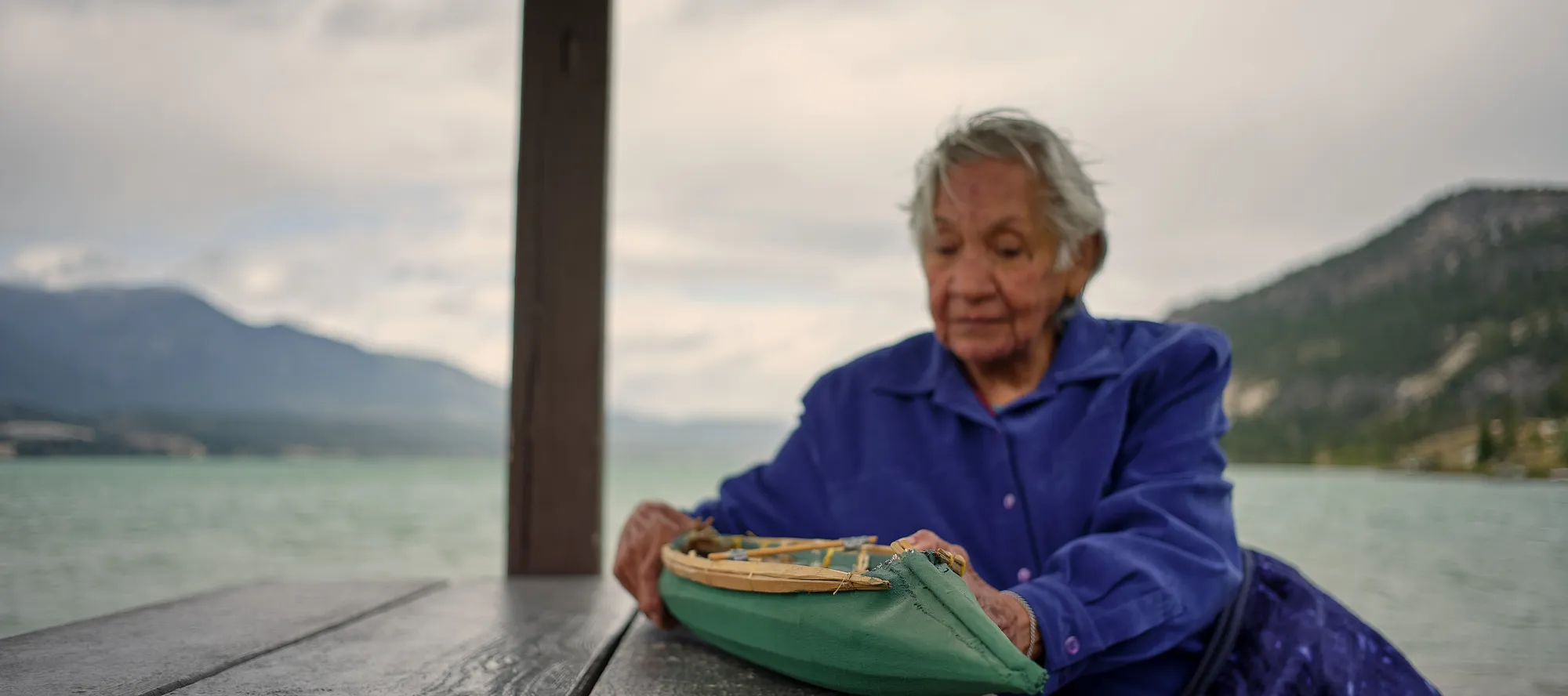 Ktunaxa_Columbia Lake BC_Tilley Memorial Park elder showing sturgeon-nosed canoe Photo credit: Kyle Hamilton/ZenSeekers/#ktunaxahomelands